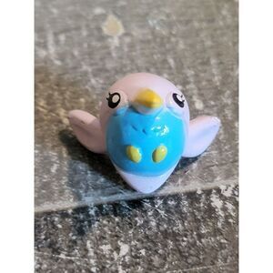 Miniature purple blue hummingbird toy figure animal